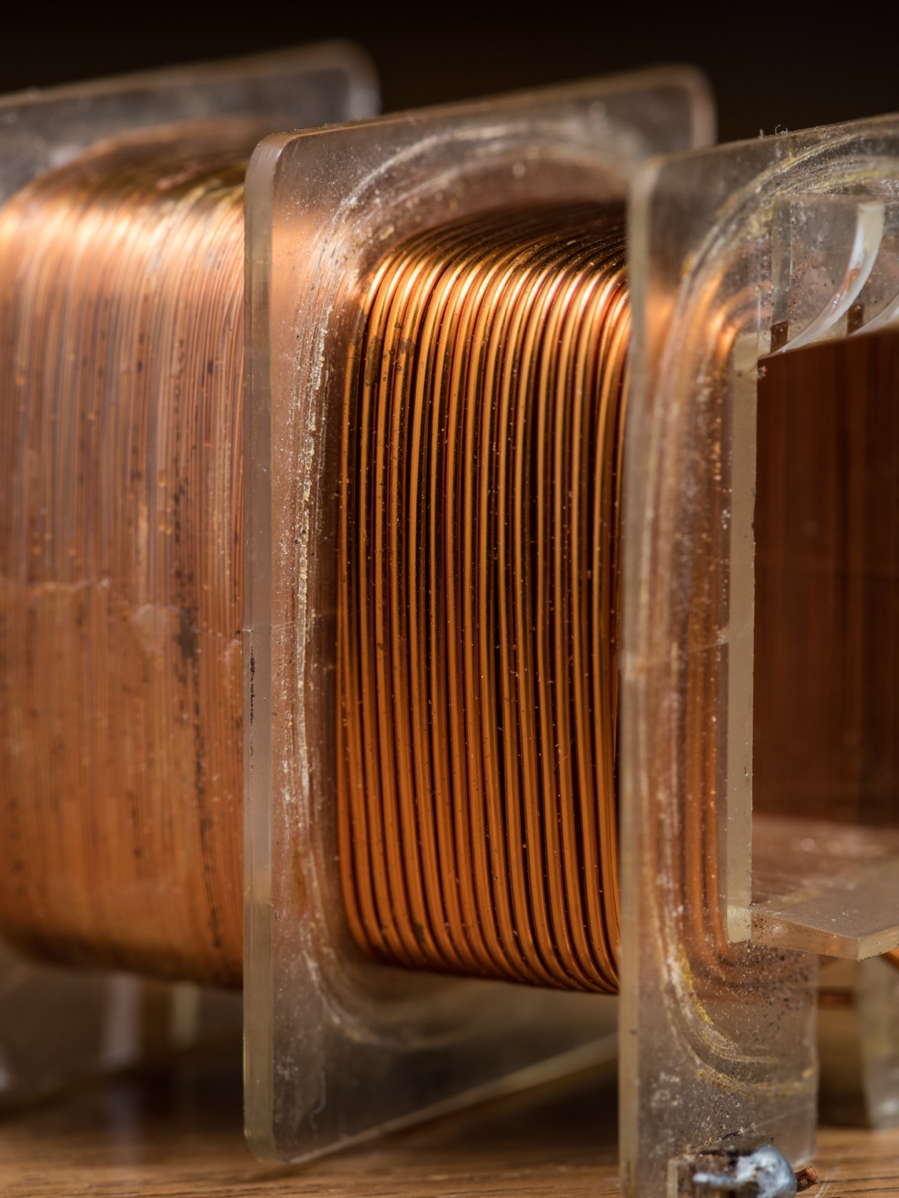 Close-up of precision copper winding on bobbin inductor